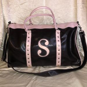 Brown and Pink “S” monogram duffel travel bag